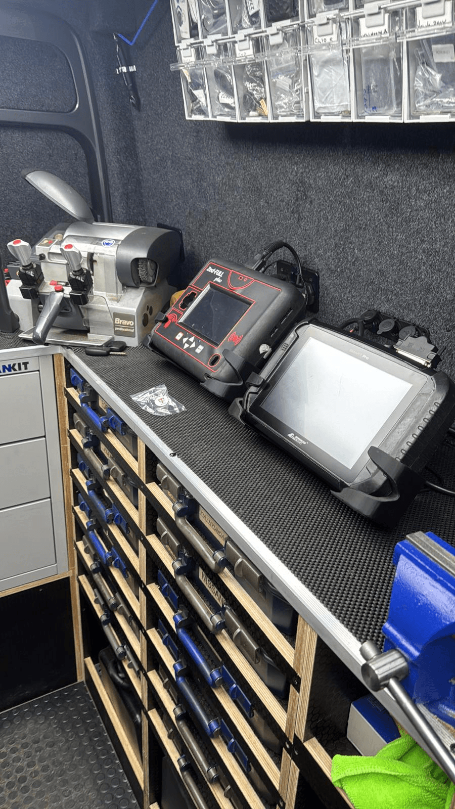Mobile workshop with diagnostic tools and key cutting equipment